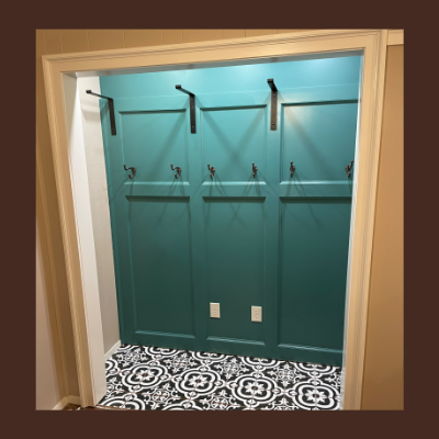 Custom closet renovation, removed portion of wall and created a family landing closet with tile floor and custom wall feature - Creative Timberworks, Abilene TX