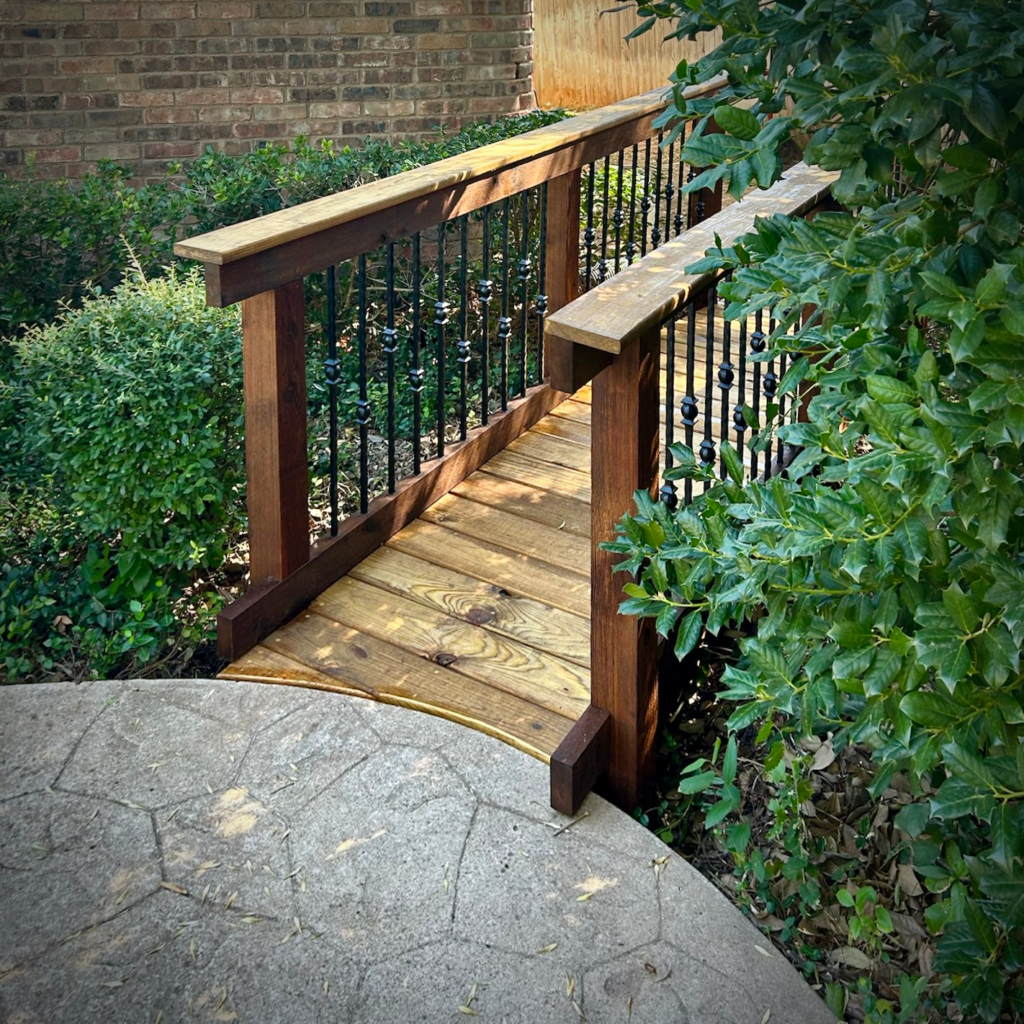 Custom Wood and metal back yard bridge over backyard stream in Abilene TX - Creative Timberworks, Abilene TX