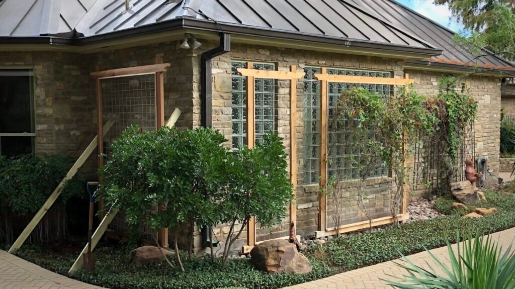 Custom garden trellis and arbor along a backyard walkway